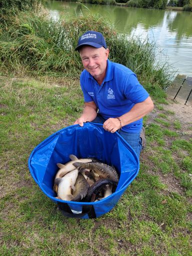 Jamie with part of his 115lb catch from Topcroft on a Club Match.