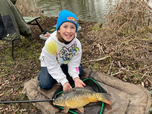 A lovely mirror carp for Sophia caught from Little Melton A lovely mirror carp for Sophia caught from Little Melton